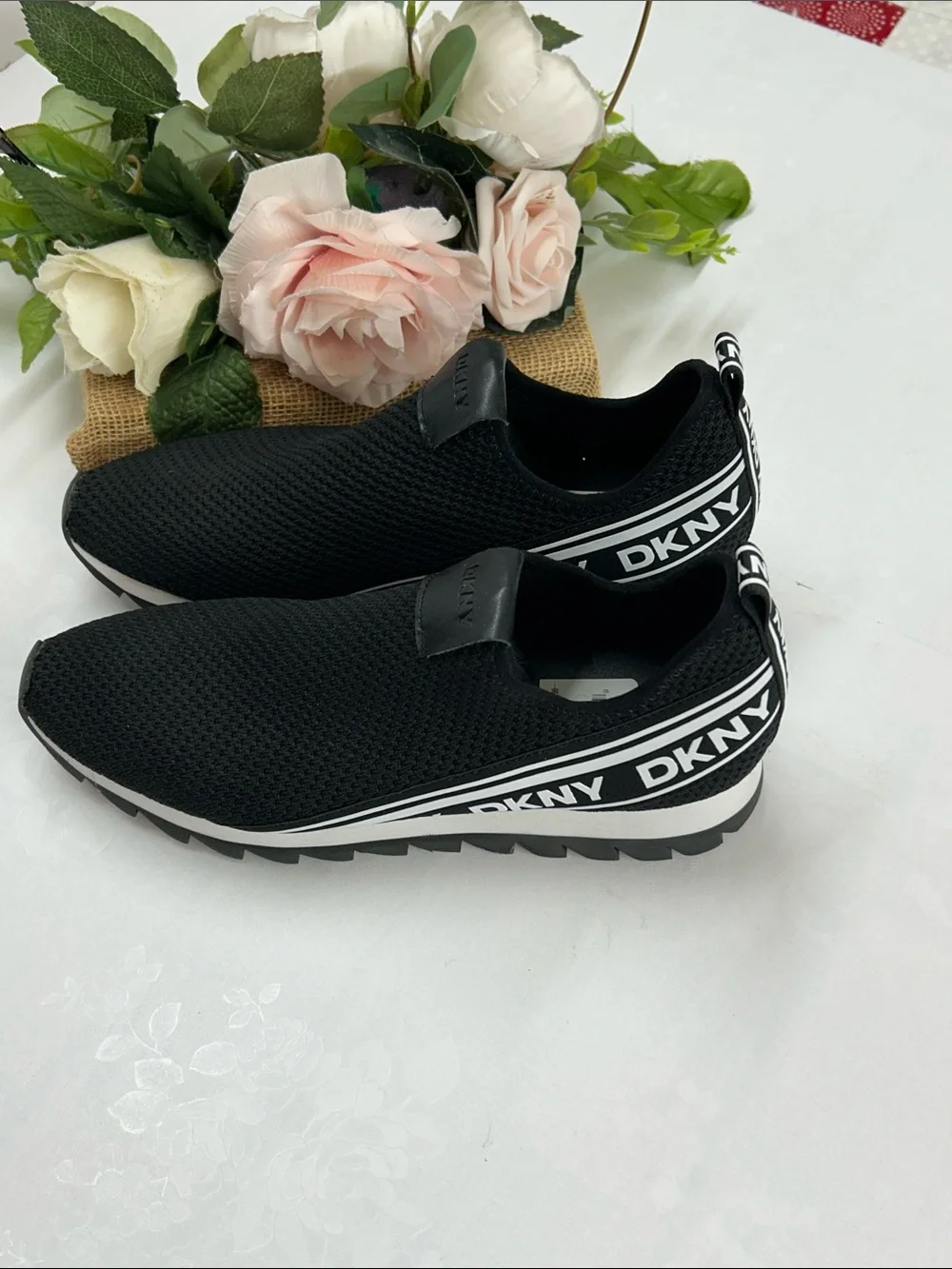DKNY Black Knit Slip-On Sneakers with White Accents